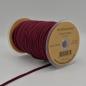 Preview: Kordel rund 6 mm in Bordeaux, aufgerollt neben weiteren Farben der Reihe